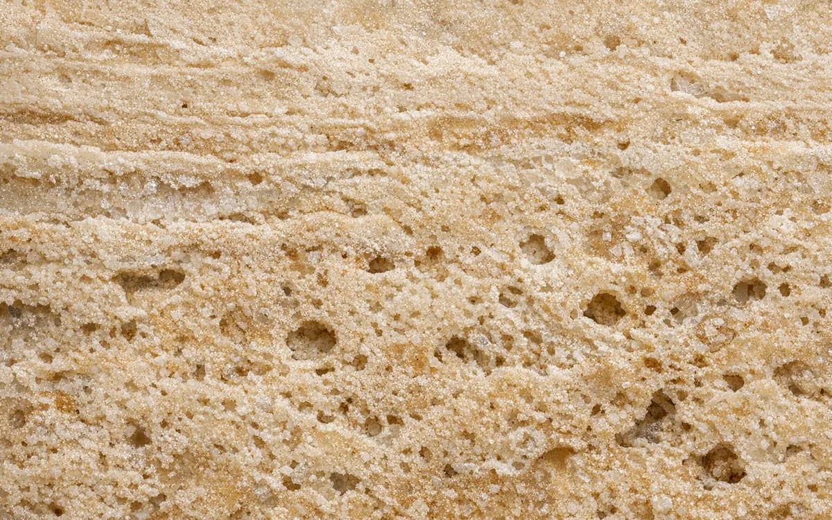 Macro detail of Travertine — texture and structure